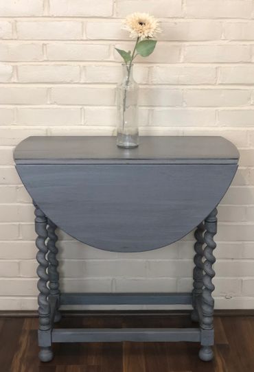 Antique table painted with glaze finish.