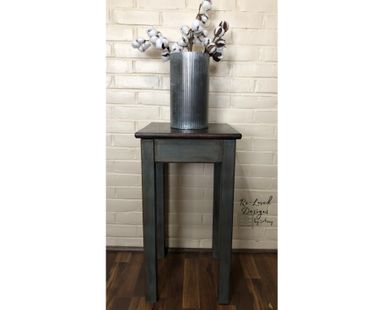 Plant/telephone stand with gel stained top and paint/glaze finish on bottom.