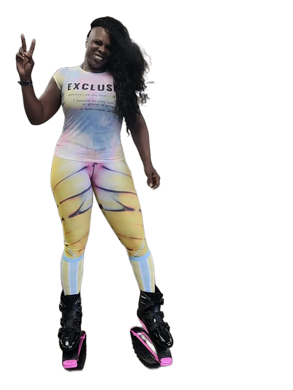 A woman in yellow pants and white shirt on roller blades.