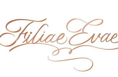 Elegant calligraphy spelling 'Filiae Evae' in rose gold.