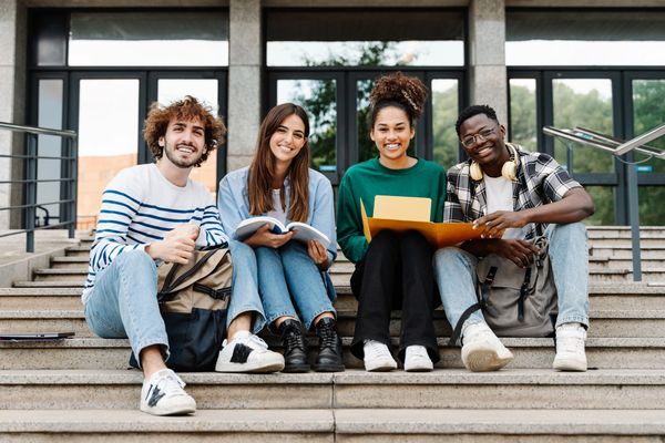 Jesus on Campus, students studying on a college campus.