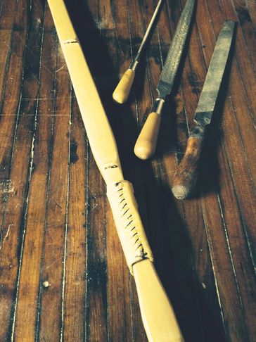 Bamboo backed bow and bow building tools.