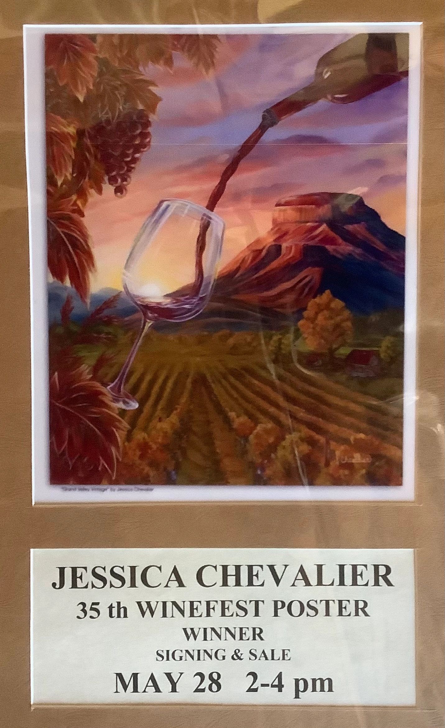 Painting of wine pouring into a glass with vineyard and mountain at sunset.