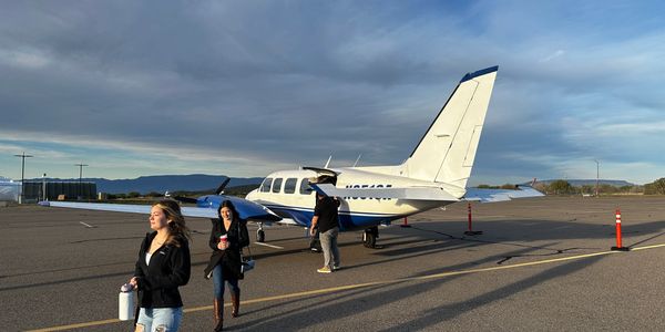 Women leaving private plane in Sedona