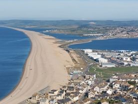 View from Isle of Portland of the harbour and Chesil Beach.
