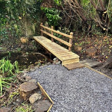 we have refurbished the garden by restoring a charming wooden footbridge over the stream