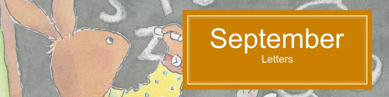 Bunny writing the alphabet on the chalkboard.