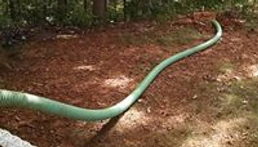 Roanoke, VA Septic Tank Drainage
Long hose to protect yard