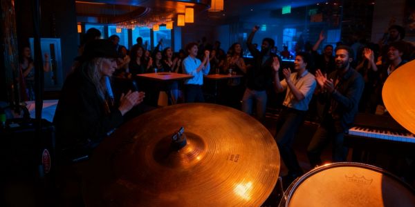 Audience enjoying live music performance in an intimate venue.