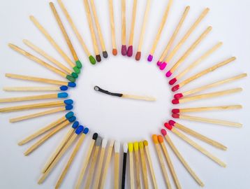 Data and Diversity represented by an image of matchsticks with diverse colourful tips, presented in 