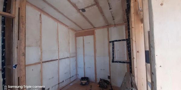 Fiberglass insulation installed in a new build, Nelson BC