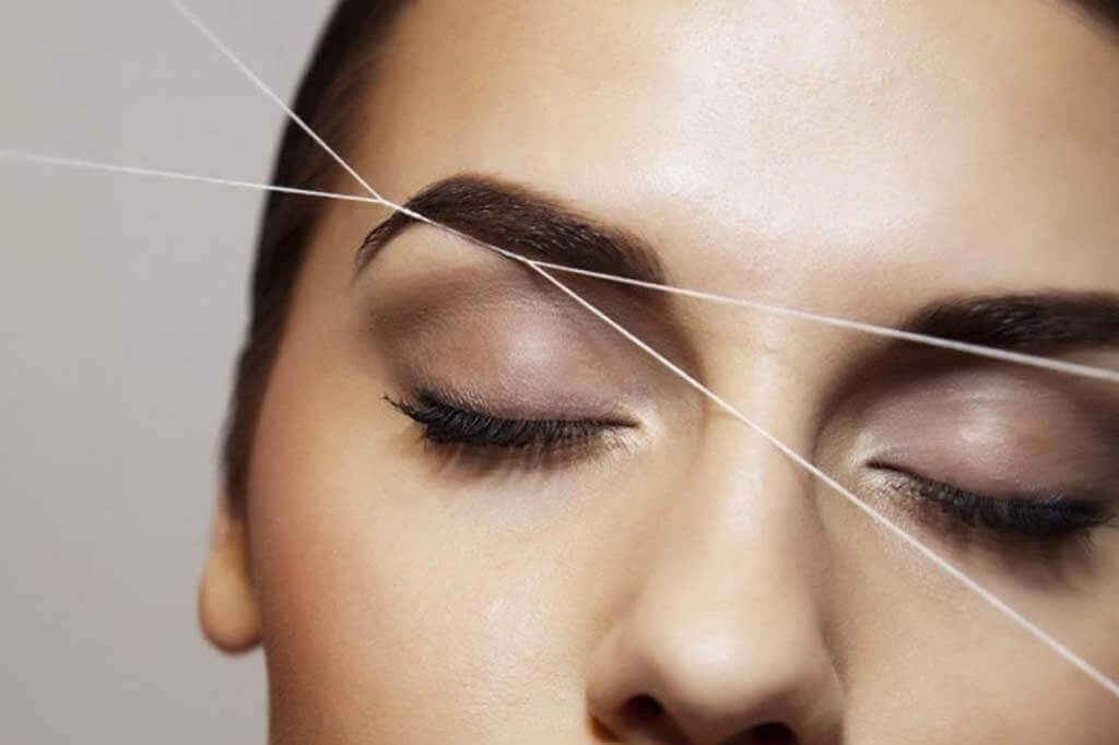 Eyebrow threading or Waxing
