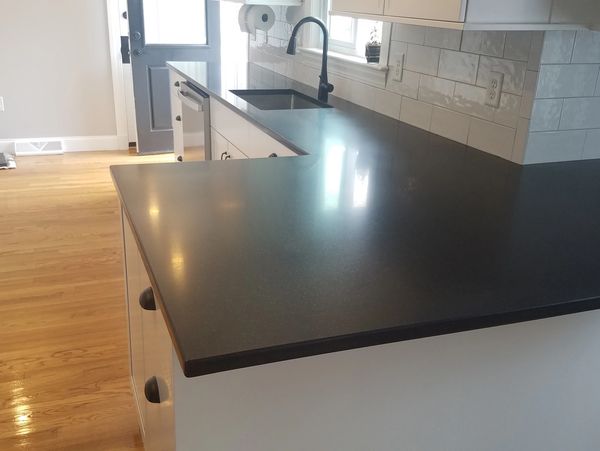 Honed Black Granite countertops. refinished.