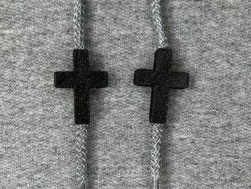Shimmer black crosses on a grey sweatshirt