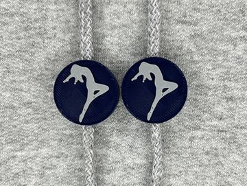 Silhouetted dance charm in navy blue and gray on sweatshirt drawstring.
