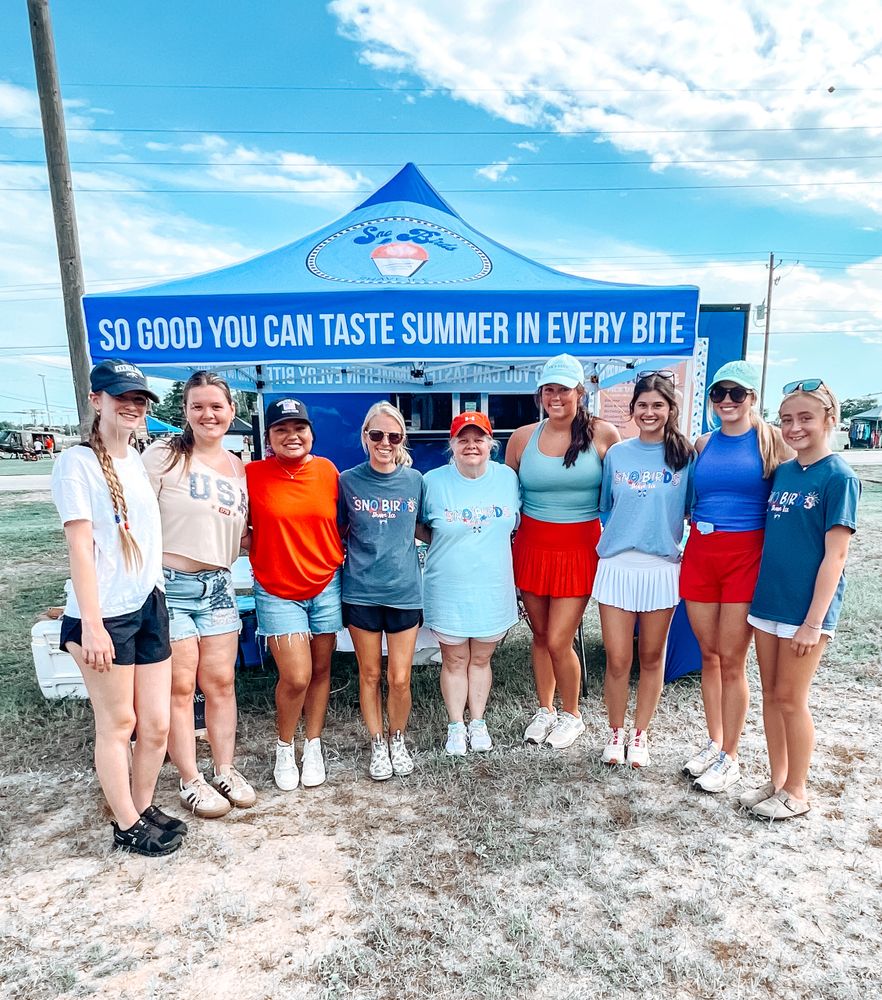 Owner with her employees  