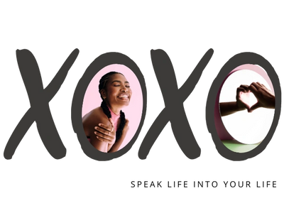 Young black woman hugging herself with self love