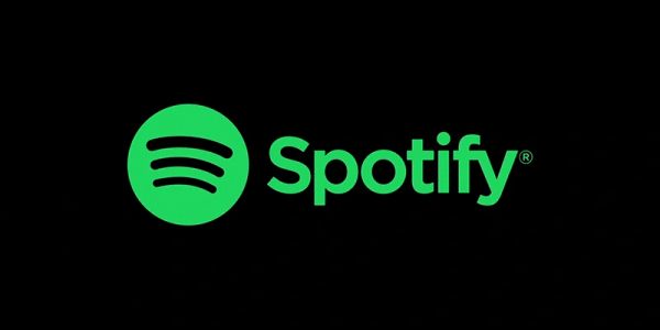 Spotify logo on black background.