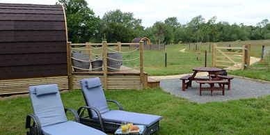 Sit back and relax on sun loungers at Rutland Rural Retreats glamping pods