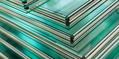 Insulated glass consists of two or more glass window panes separated by a space to reduce heat trans