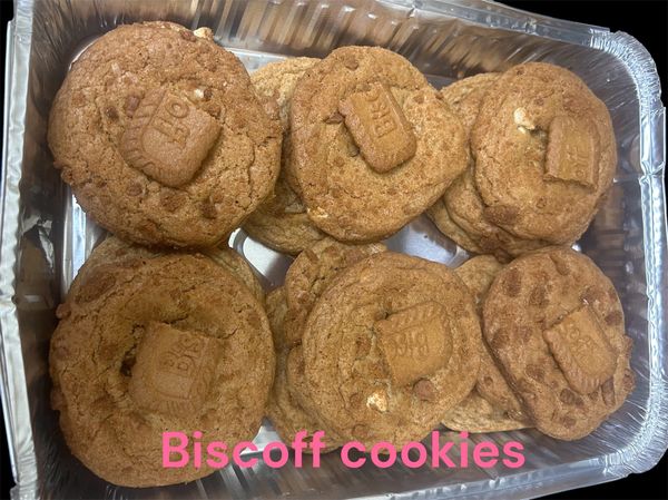 Tray of freshly baked Biscoff cookies with Biscoff biscuit pieces on top.