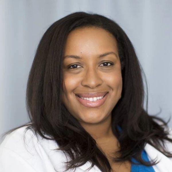 picture of Danielle Doyle M.D., smiling African - American woman