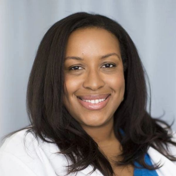 picture of Danielle Doyle M.D., smiling African - American woman