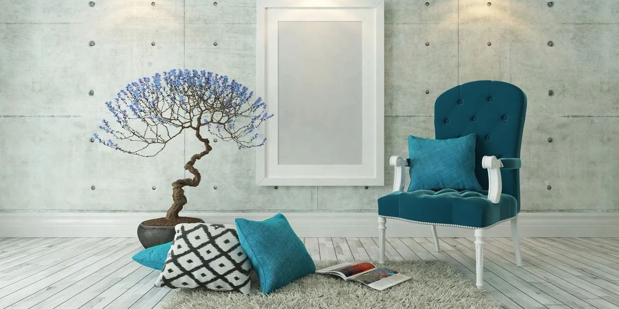 office picture blue chair blue pillows and tree with blue leaves