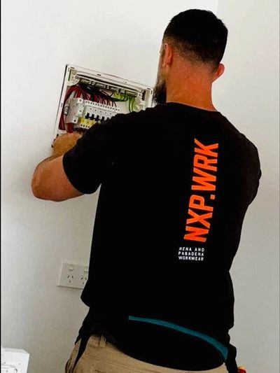 NextPhase Electrical Solutions Electrician working on switchboard Newcastle, NSW