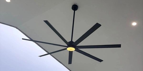 Black outdoor ceiling fan and LED downlights installed by NextPhase electrician in Warners Bay, NSW 