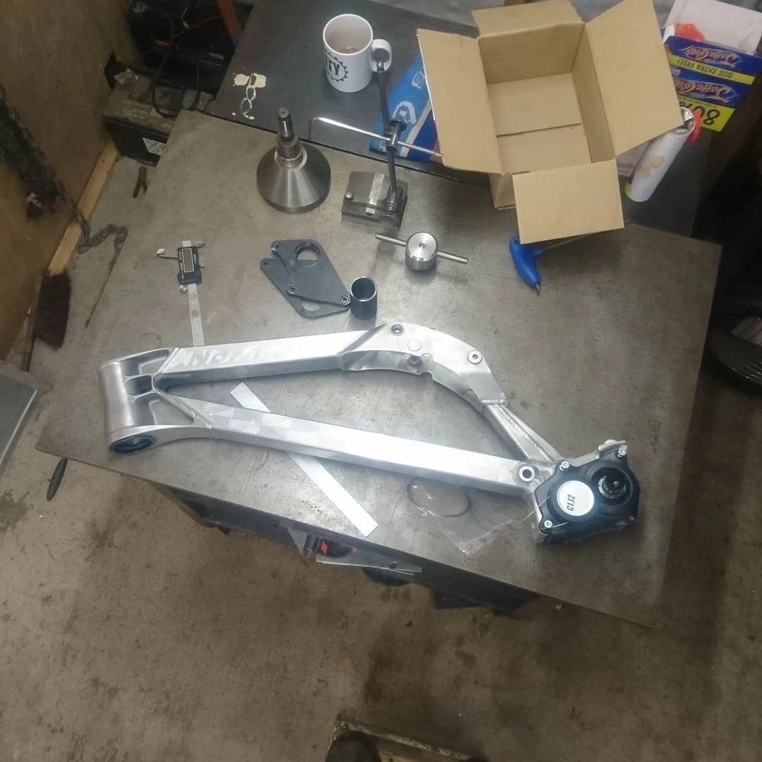 Gearbox mounted and being checked for straight
