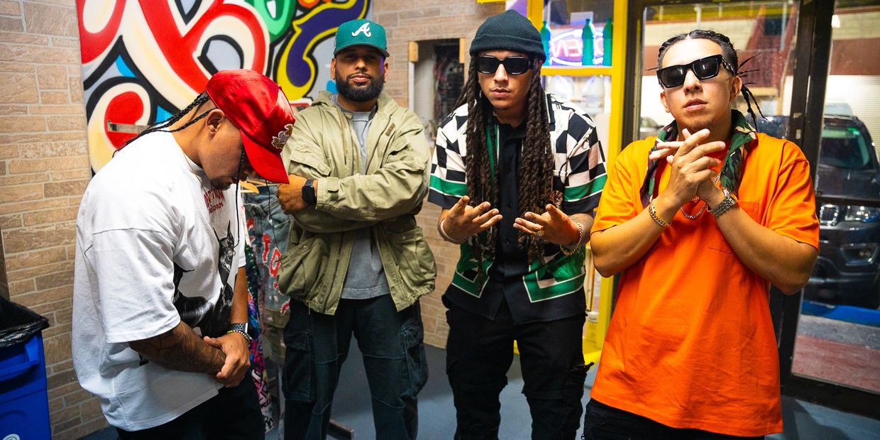 Four men (47 Republic, Bleeze, Jet Grover, YJ, JavyDade) posing in streetwear with vibrant backgroun