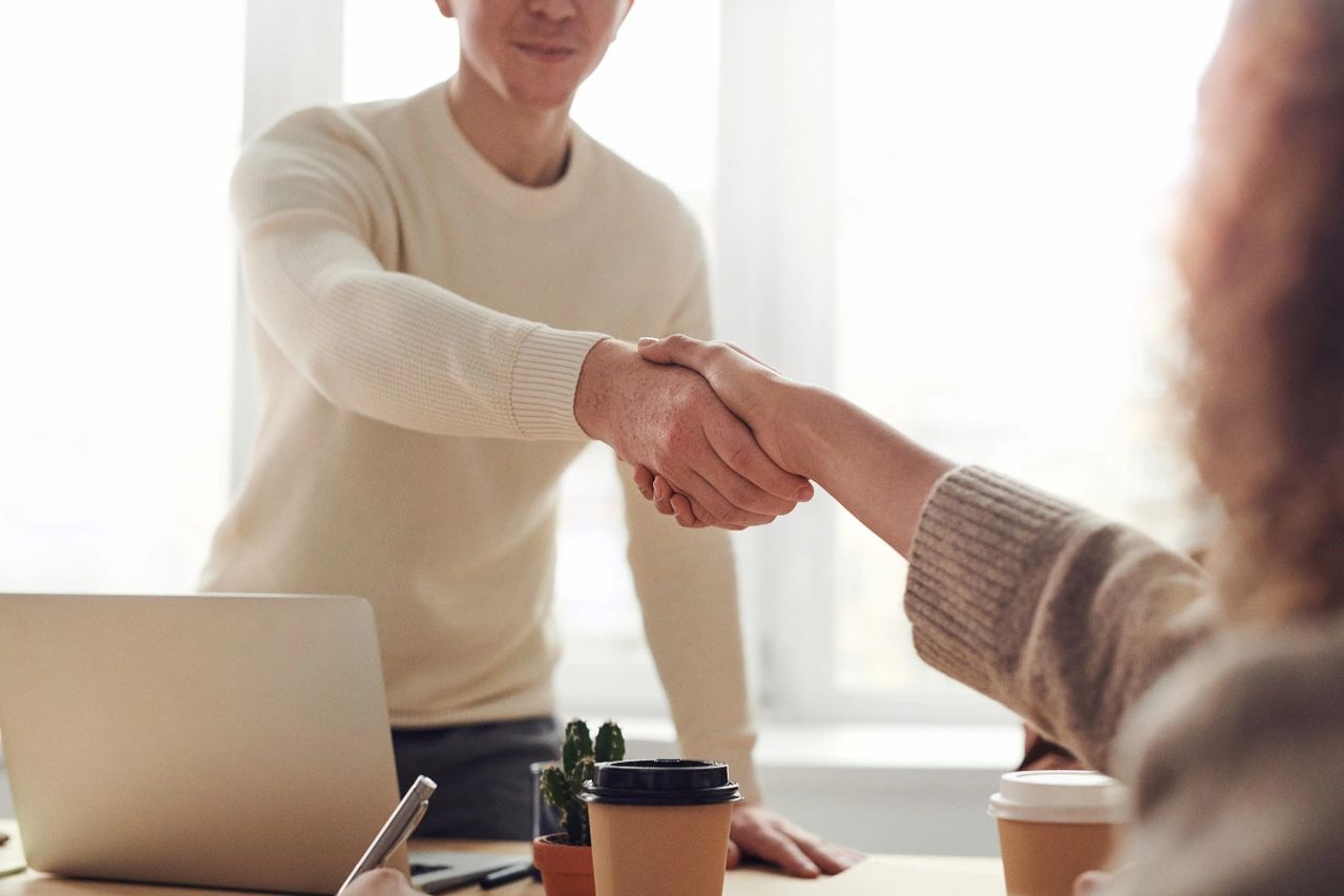 a buyer and seller conducting a real estate negotiation