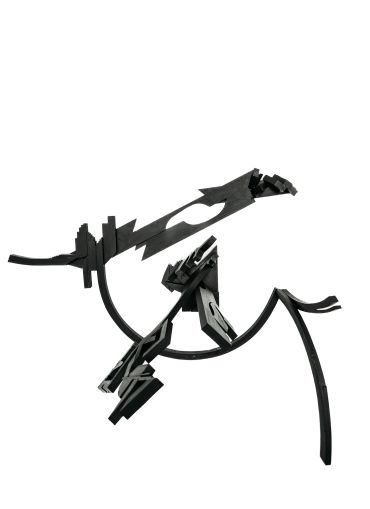 Abstract black sculpture with geometric shapes on white background.