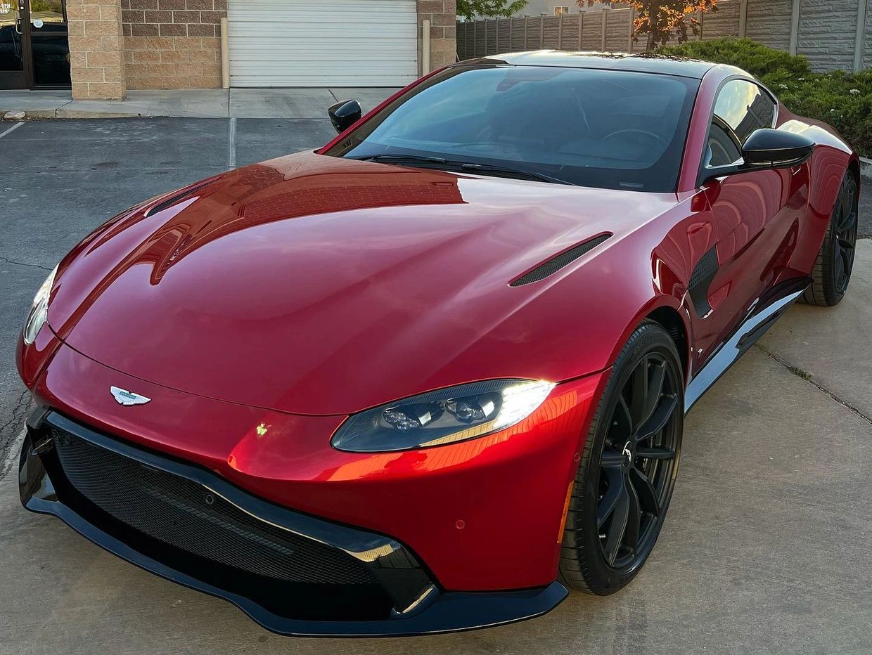 An Aston Martin with a ceramic coating applied to the paint. With Window tint outside of Tint Citi