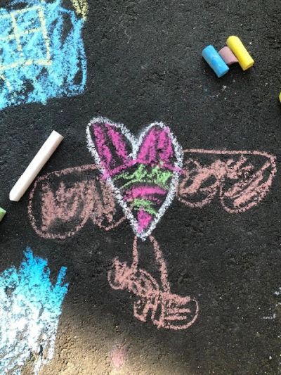 therputic art drawing of a heart with wings on 