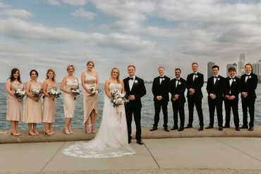 Romantic shot of the bride and groom holding hands