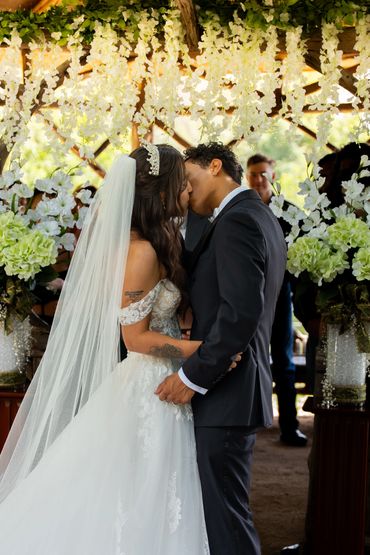 Beautiful bride smiling gracefully in her wedding attire