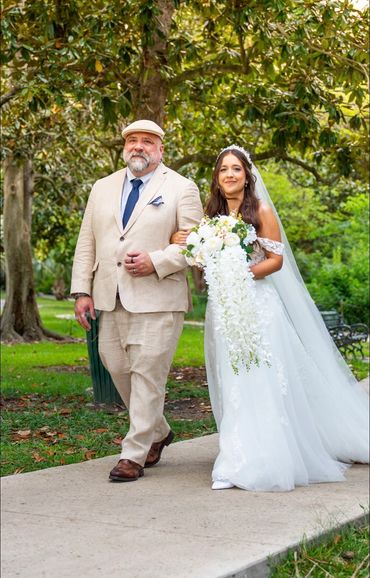 Bride posing elegantly in a stunning bridal gown