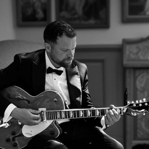 Private guitar lesson in London with professional tutor Charlie Hodgson, teaching a pupil one-to-one