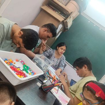 Students engaged in a classroom activity with art supplies.