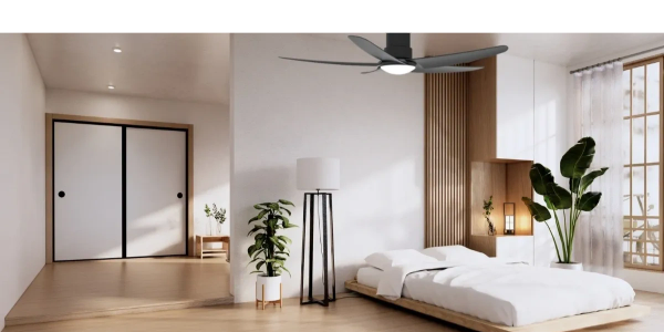 Minimalist bedroom with wooden elements and green plants.