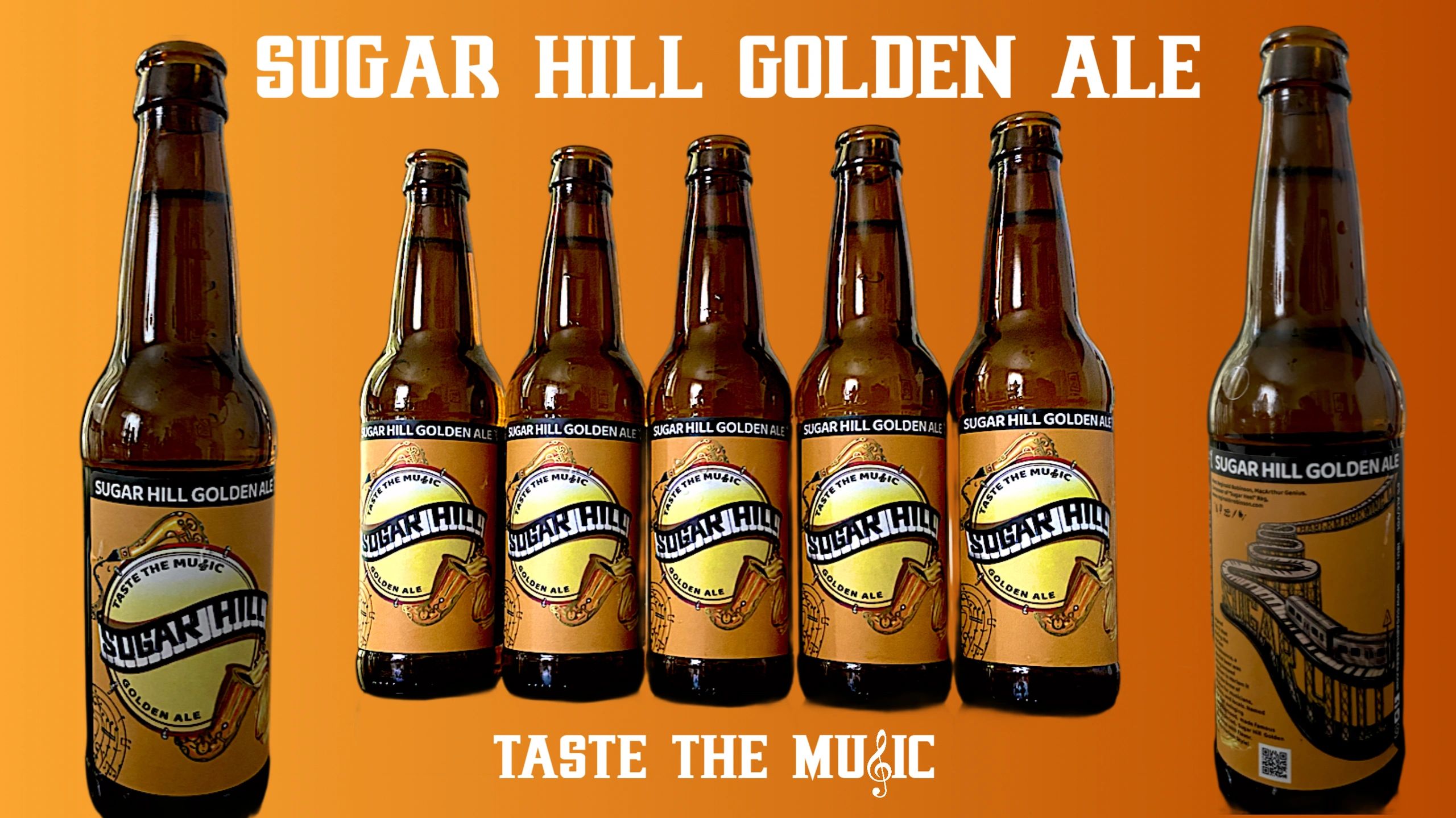 Stack of books next to pencils in a holder and a camera.