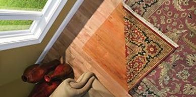 FADED WOOD FLOOR AND WINDOW
