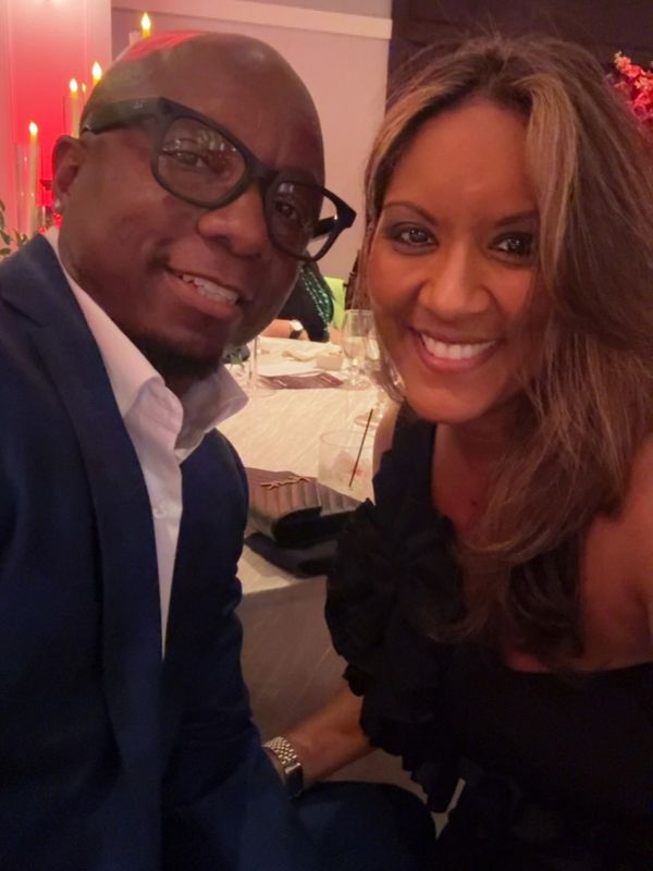 Smiling couple at a formal event.