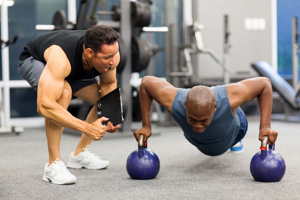 A personal trainer  and his client