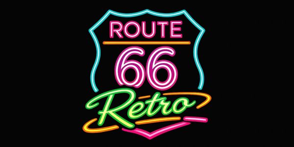 Neon sign displaying 'Route 66 Retro' in bright colors.