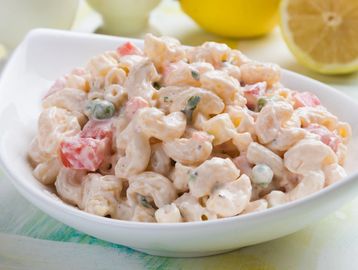Creamy macaroni salad with vegetables.