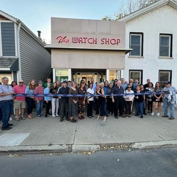 Ribbon cutting ceremony and gathering of close family and friends for the grand opening of Art on 66.