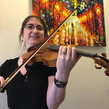 Woman playing violin with colorful painting in background.